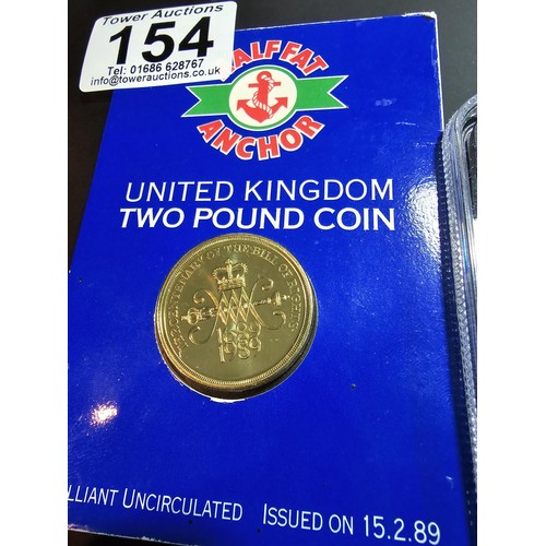 154 - 2x uncirculated £2 coins which includes the 15th anniversary of the FA cup £2 by Danbury mint collec... 