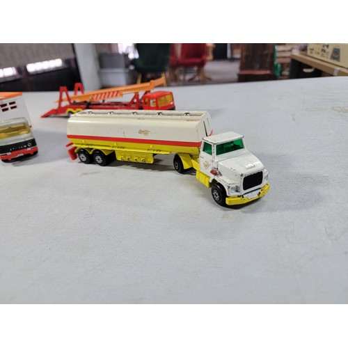 23 - Collection of 7x diecast vehicals inc a majorette car transporter, matchbox petrol tanker, solide ho... 