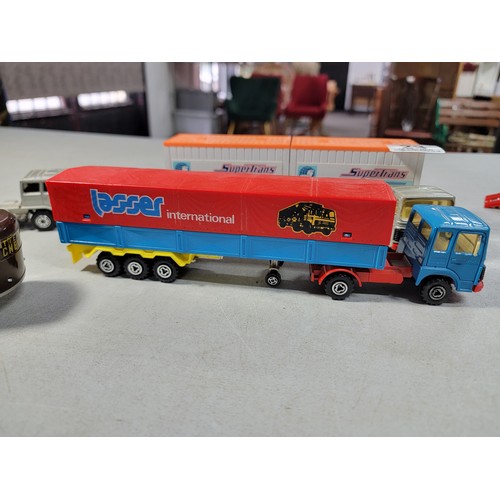 23 - Collection of 7x diecast vehicals inc a majorette car transporter, matchbox petrol tanker, solide ho... 