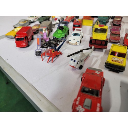 29 - Large quantity of diecast vehicles inc a subaru imprezza, rescue helicopter, fire engine, landrover,... 