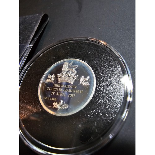 156 - A Jubilee mint solid silver proof commemorative coin for the birthday of Queen Elizabeth II. The coi... 