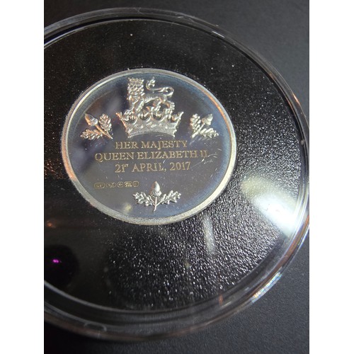 156 - A Jubilee mint solid silver proof commemorative coin for the birthday of Queen Elizabeth II. The coi... 