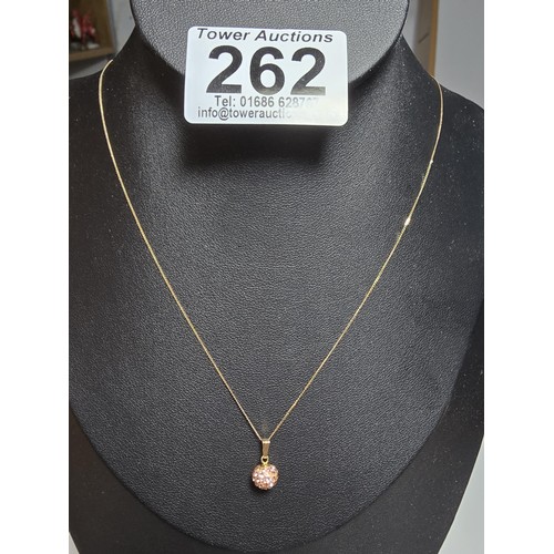 262 - A 9ct yellow gold necklace with a crystal ball pendant, in excellent clean condition and boxed. Tota... 