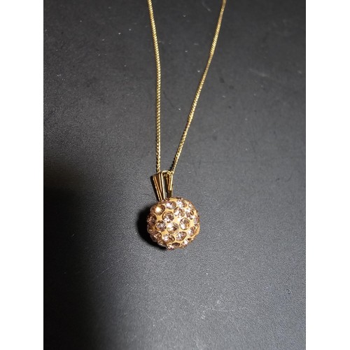 262 - A 9ct yellow gold necklace with a crystal ball pendant, in excellent clean condition and boxed. Tota... 