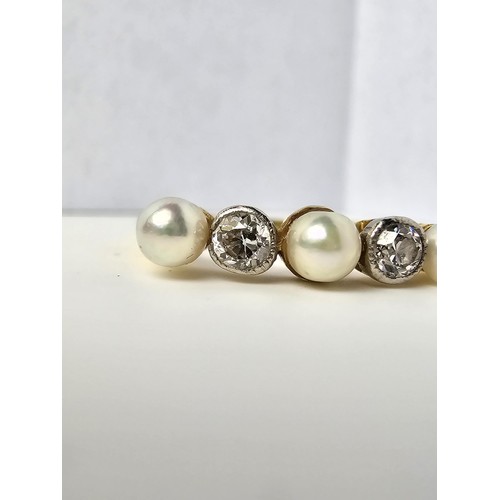 264 - A fine quality 18ct yellow gold pearl and diamond ring inset with 2 large diamonds, combined weight ... 