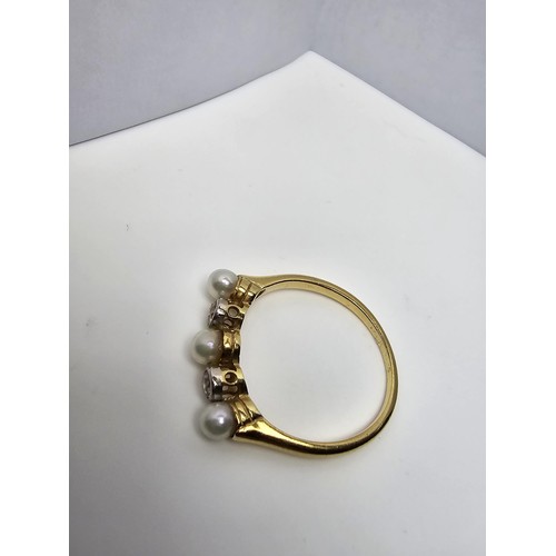 264 - A fine quality 18ct yellow gold pearl and diamond ring inset with 2 large diamonds, combined weight ... 