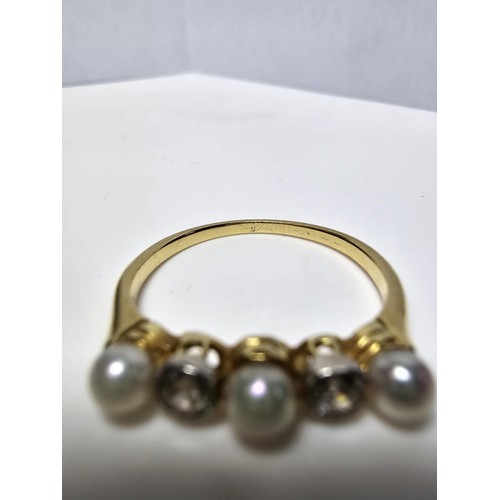 264 - A fine quality 18ct yellow gold pearl and diamond ring inset with 2 large diamonds, combined weight ... 