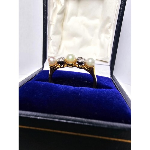 264 - A fine quality 18ct yellow gold pearl and diamond ring inset with 2 large diamonds, combined weight ... 