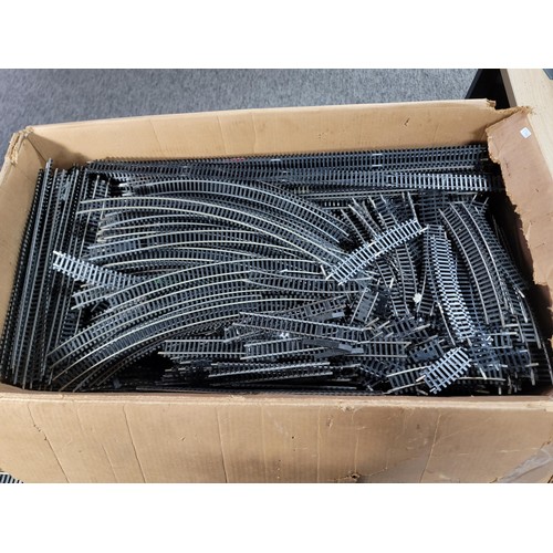 43 - Box containing a very large quantity of 'OO' gauge train track inc straights and curves