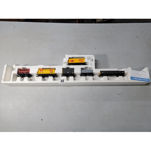 48 - Model Hornby train set stored in polystyrene - rolling stock inc Regent, shell, Red Star Parcels etc