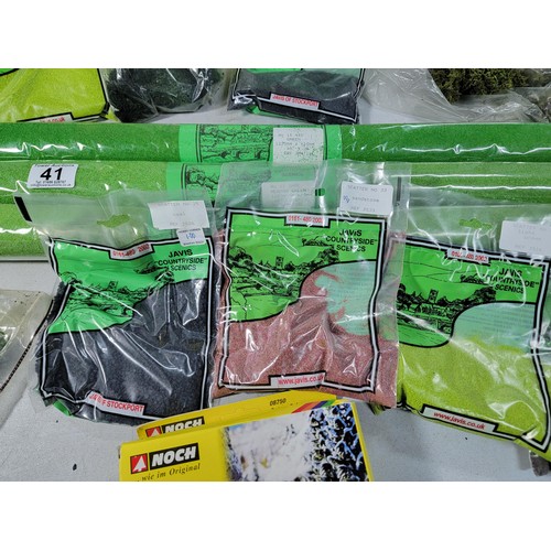 41 - Green tub of model railway countryside grass mats, trees and other foliage, most are sealed as new i... 