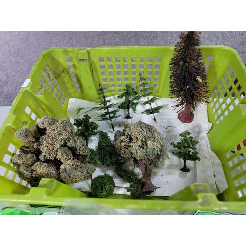 41 - Green tub of model railway countryside grass mats, trees and other foliage, most are sealed as new i... 