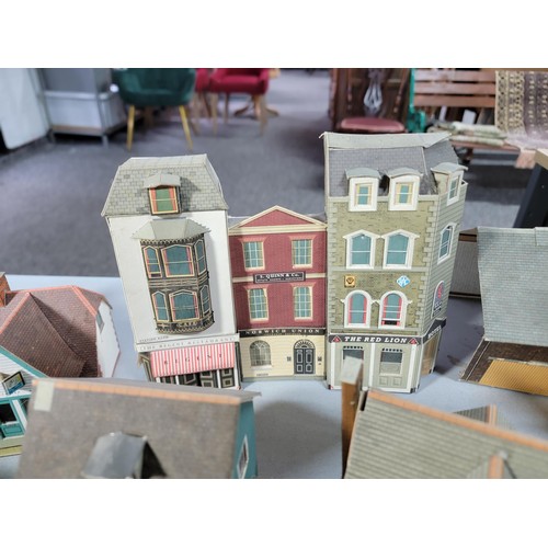 42 - Large box full of model railway buildings made of cardboard inc railway station, town hall, houses, ... 