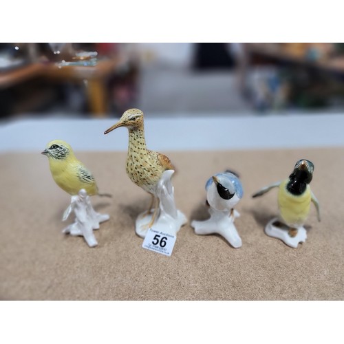 56 - 4x good quality Karl ENS ceramic figures of birds each stamped to the base inc a penguin, curlew etc... 