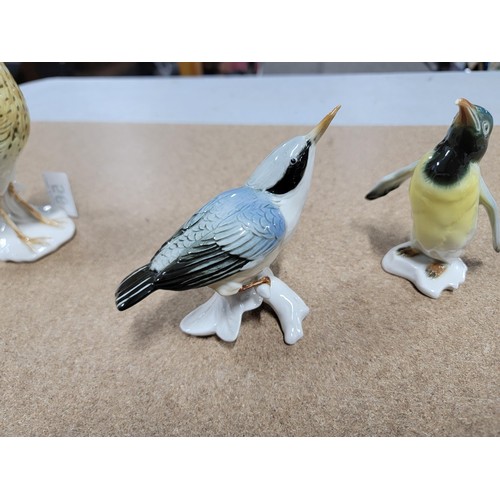 56 - 4x good quality Karl ENS ceramic figures of birds each stamped to the base inc a penguin, curlew etc... 