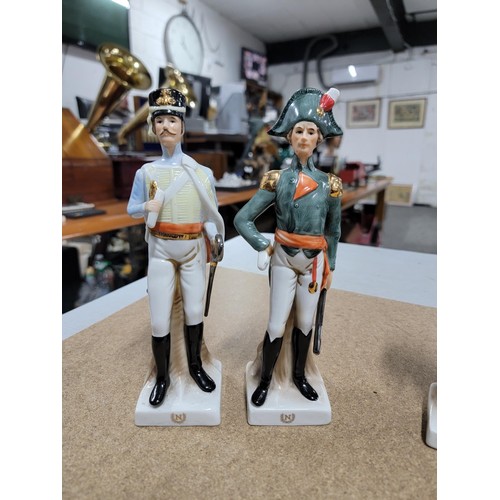 64 - Quantity of 6x ceramic solider figurines in various uniforms inc Marshall of the empire, Hussar offi... 