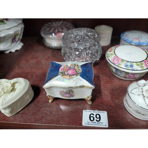 69 - A large quantity of ceramic and glass trinket boxes most with lids, inc sequin decorated trinket box... 