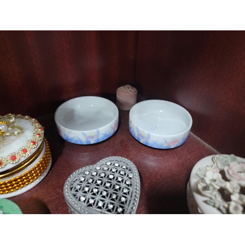 69 - A large quantity of ceramic and glass trinket boxes most with lids, inc sequin decorated trinket box... 