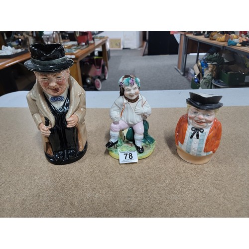 78 - A genuine antique Staffordshire figure 'The Jolly Farmer' sitting on a keg, along with a Royal Doult... 