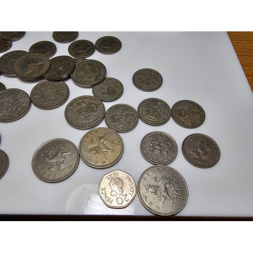 231 - a bag full of various vintage British one shilling and 2 shilling coins.