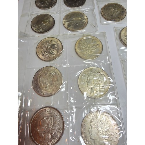 232 - A large collection of 48x reproduction novelty American coins ideal as coin fillers for coin albums.