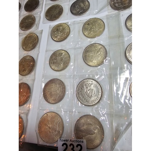 232 - A large collection of 48x reproduction novelty American coins ideal as coin fillers for coin albums.