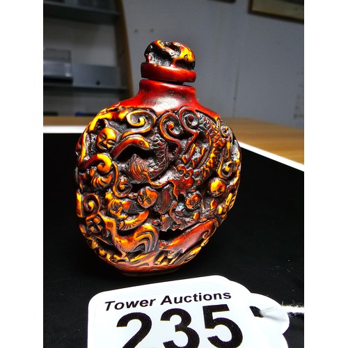 235 - A good vintage Chinese carved snuff bottle featuring intricate deep carved scene to the sides featur... 