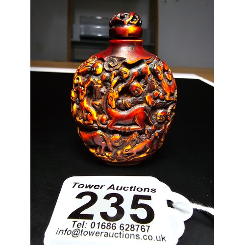 235 - A good vintage Chinese carved snuff bottle featuring intricate deep carved scene to the sides featur... 