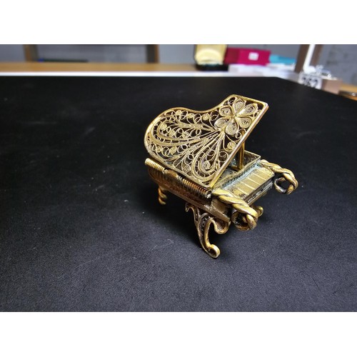 248 - 3x ornate ornamental grand pianos which include a large .950 solid silver piano featuring a filigree... 