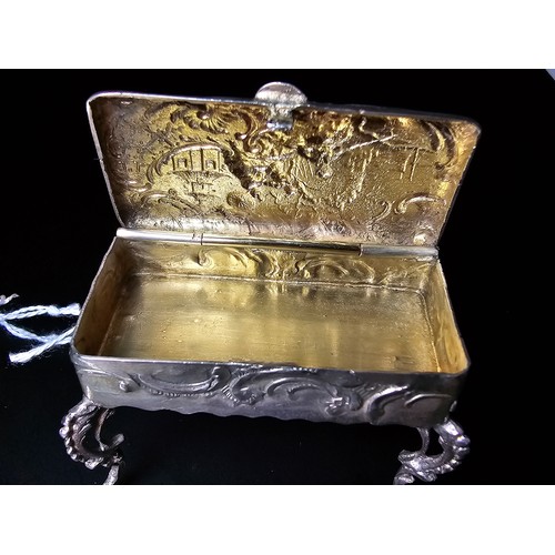 239 - Antique fine quality dutch sterling silver footed table snuff box of furniture form with an ornate e... 