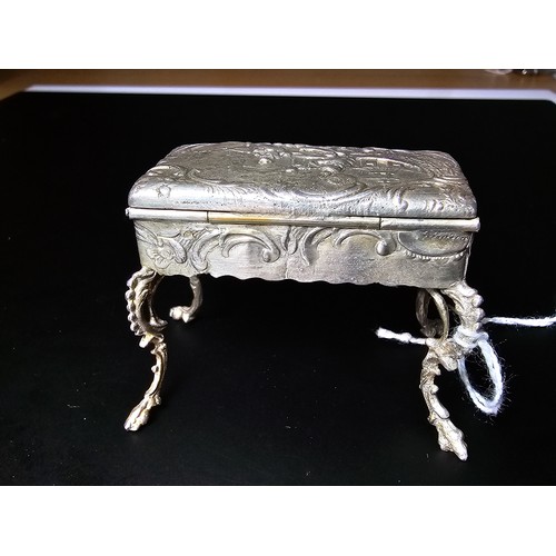 239 - Antique fine quality dutch sterling silver footed table snuff box of furniture form with an ornate e... 