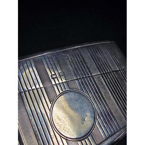 240 - An antique hallmarked silver card case shape for the hip featuring a classic early 20th century stri... 