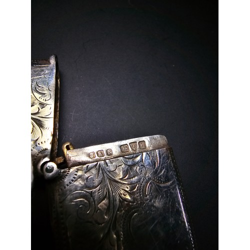 241 - A good quality antique hallmarked silver Vesta case with an engraved design to the front and back ha... 