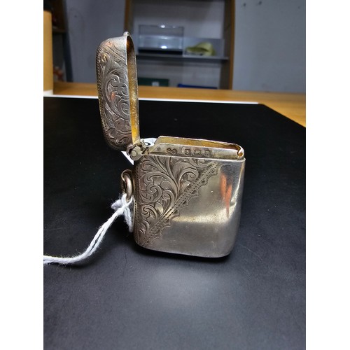 244 - Hallmarked silver vesta case with engraved design to the front and back in good condition hallmarked... 