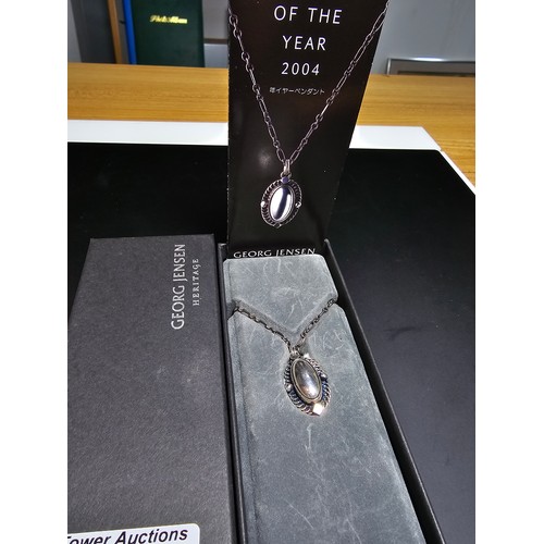 271 - A stunning Georg Jensen heritage pendant of the year 2004 925 silver pendant and 18