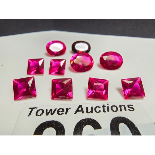 260 - A collection of 9x lab created faceted ruby gemstones along with a faceted almandine garnet gemstone... 