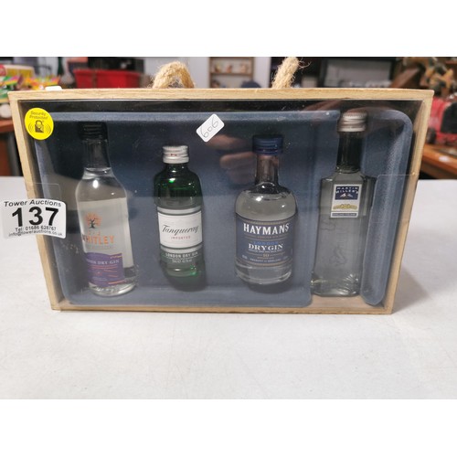 137 - New gift set of various gin miniatures complete in wooden presentation gift box.