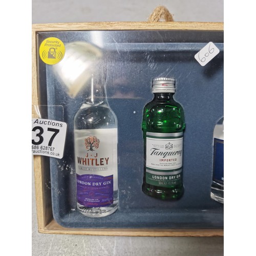 137 - New gift set of various gin miniatures complete in wooden presentation gift box.