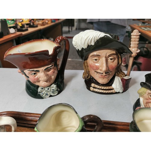 139 - Qty of various collectable character toby jugs along with a good quality wooden oak butlers tray.