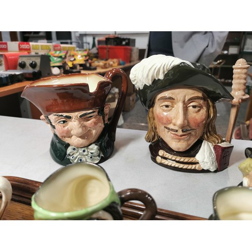 139 - Qty of various collectable character toby jugs along with a good quality wooden oak butlers tray.