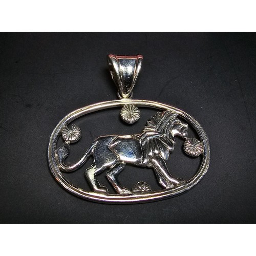 177 - A good quality unused Danish sterling silver pendant with a lion design marked to the rear sterling ... 