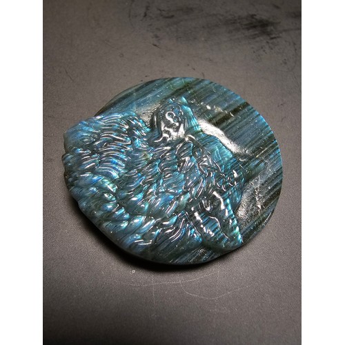 180 - A stunning carved labradorite stone specimen featuring a wolf design, the labradorite has beautiful ... 