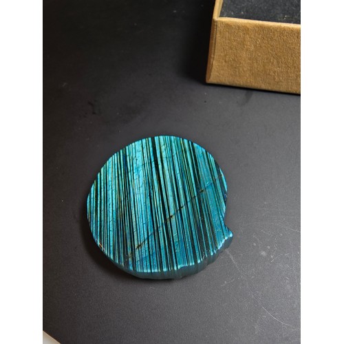 180 - A stunning carved labradorite stone specimen featuring a wolf design, the labradorite has beautiful ... 