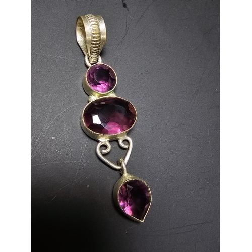 187 - An Impressive 925 silver long drop pendant inset with 3x faceted crystal purple glass stones, in exc... 