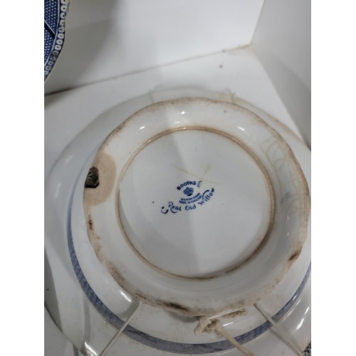 91 - Quantity of vintage blue and white plates inc Royal Doulton, Booths etc, one dish has a cip to the r... 