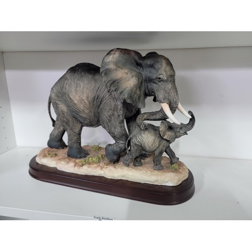 92 - Shelf full of collectables inc a large resin Leonardo collection elephant with baby, 4x Sylvac dogs,... 