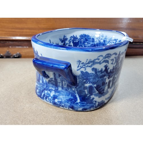 99 - Good quality Victoria ware ironstone foot bath / planter in a blue and white glaze with handles to t... 