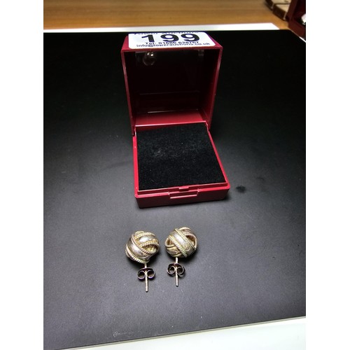 199 - Pair of ornate 925 Silver large knot formed stud earrings in clean condition - boxed.