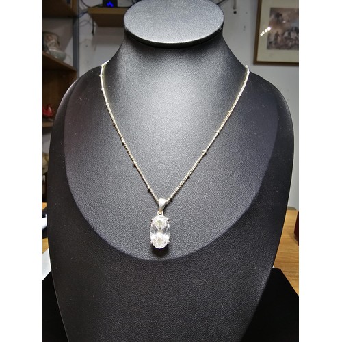 195 - An pretty 925 silver large faceted crystal pendant on an attractive 18