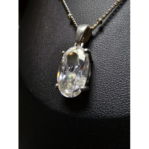 195 - An pretty 925 silver large faceted crystal pendant on an attractive 18